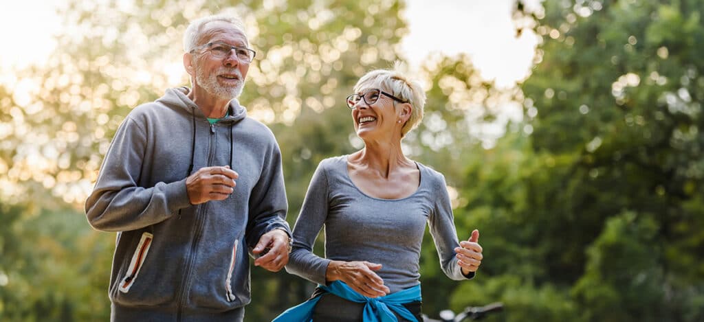 healthy mature couple exercising