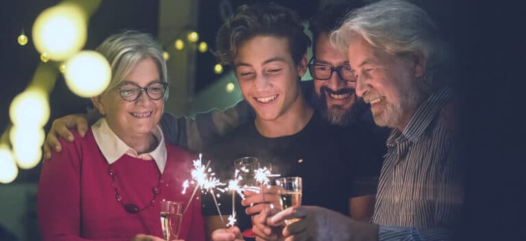 Family Celebrating the New Years while prioritizing hearing health
